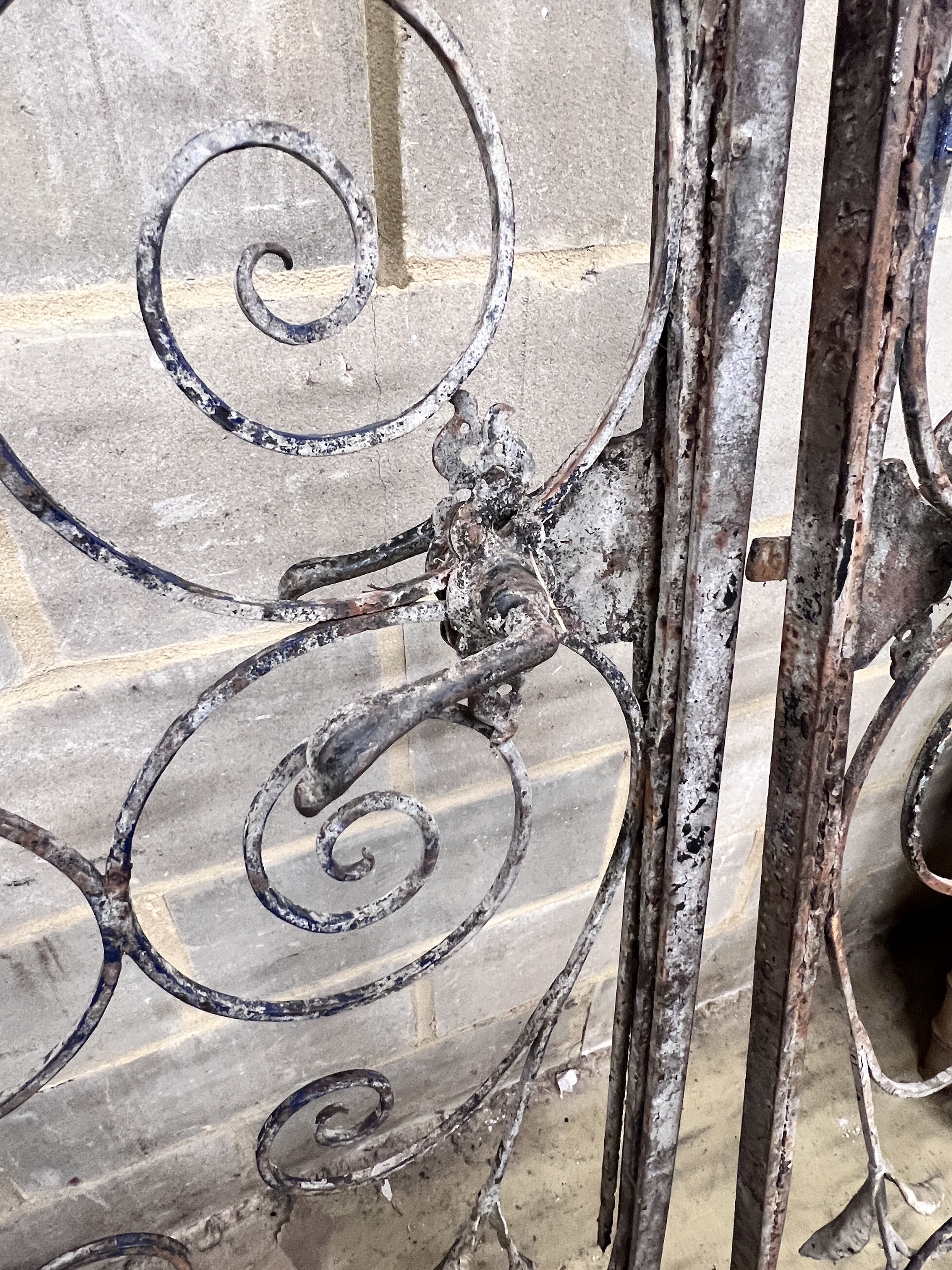 A pair of vintage French wrought iron gates, width 110cm, height 250cm